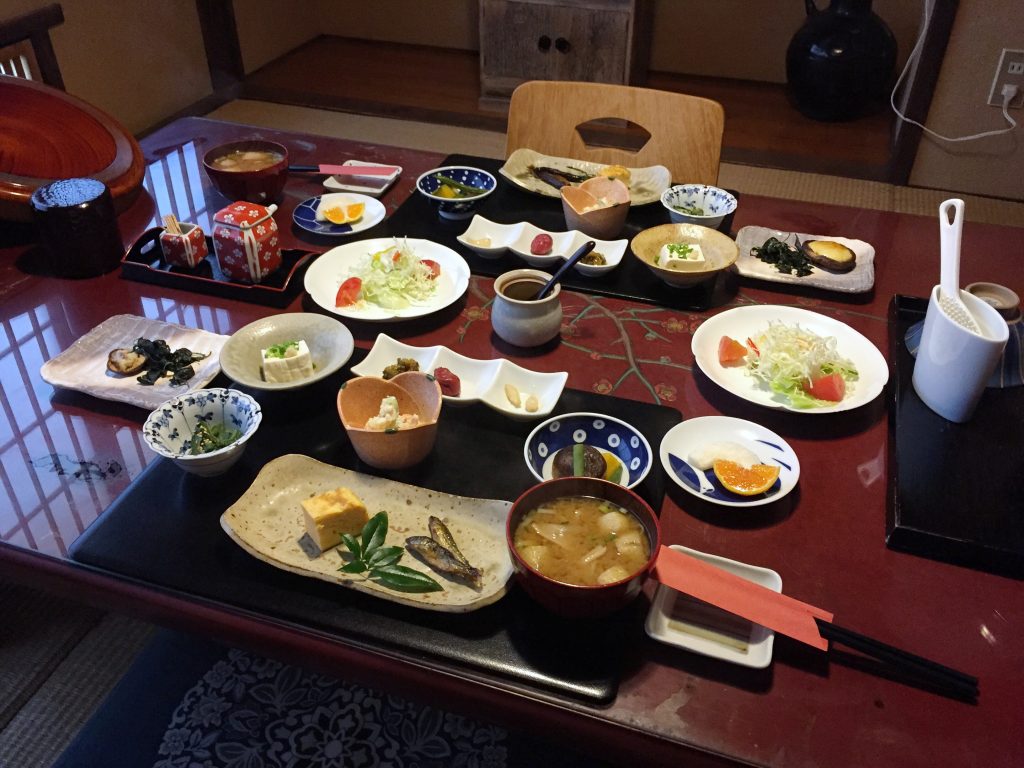 Japanese meal served on a variety of ceramic dishes in Kyushu