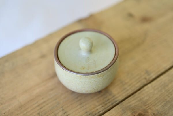 small lidded container